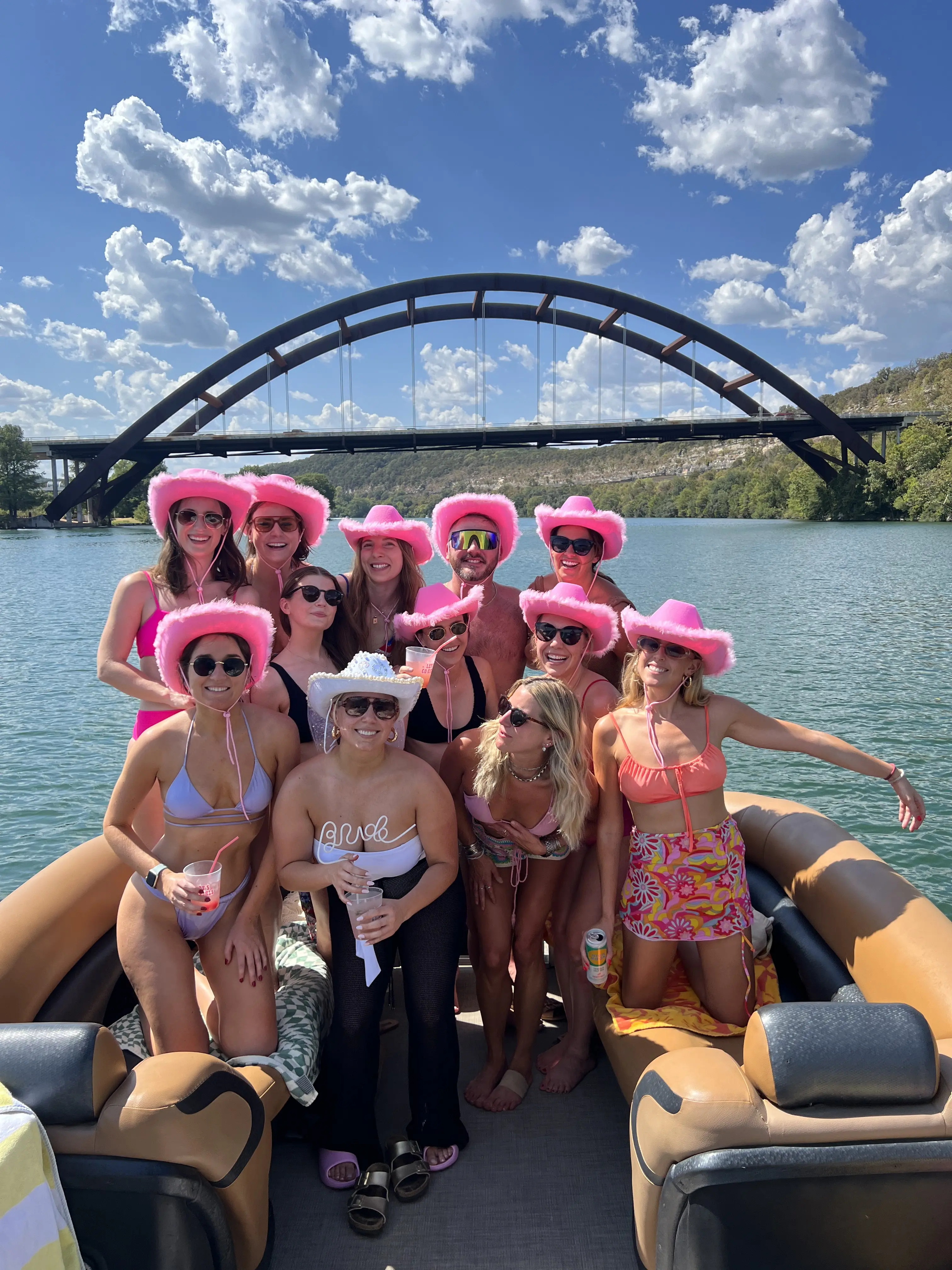 Group on a pontoon on Lake Austin for a bachelorette or party